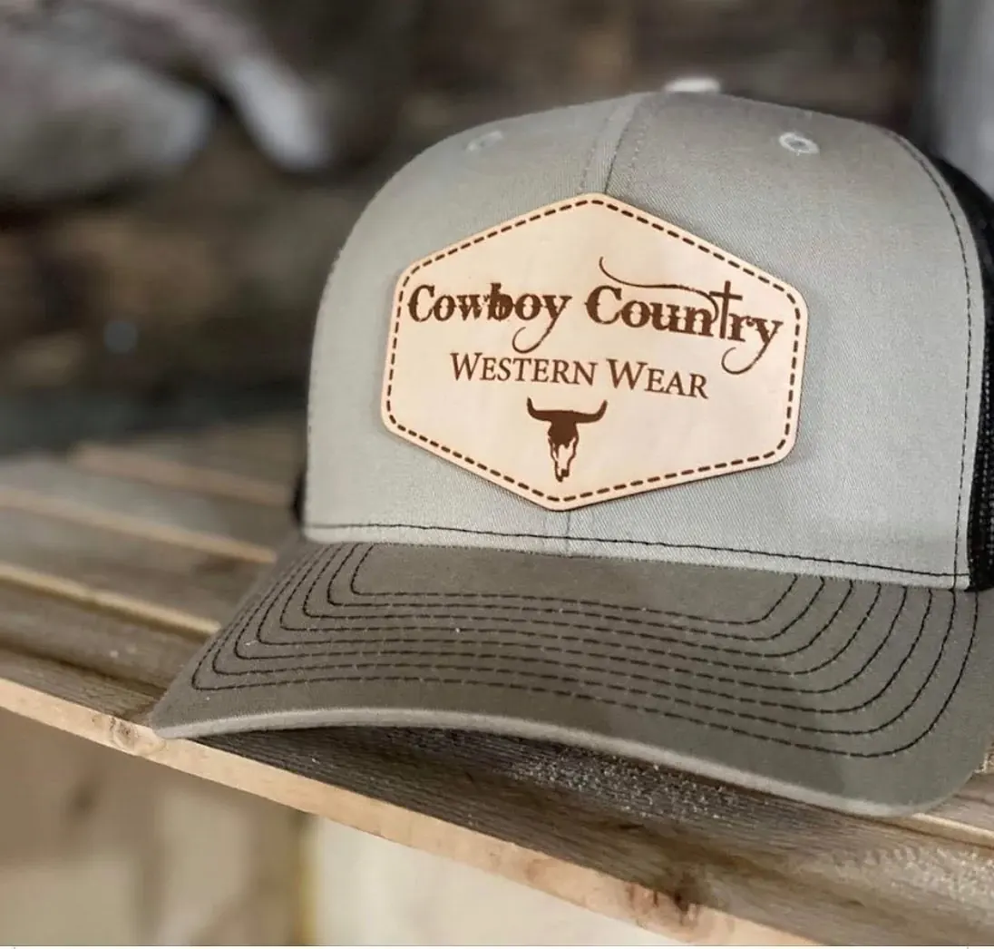 Cowboy Country Western Wear branded leather-patch trucker cap