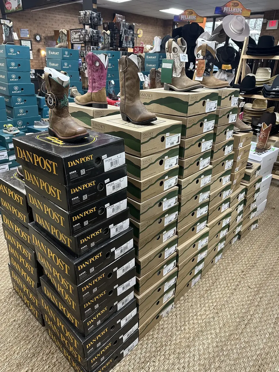 Dan Post boot boxes displayed in store
